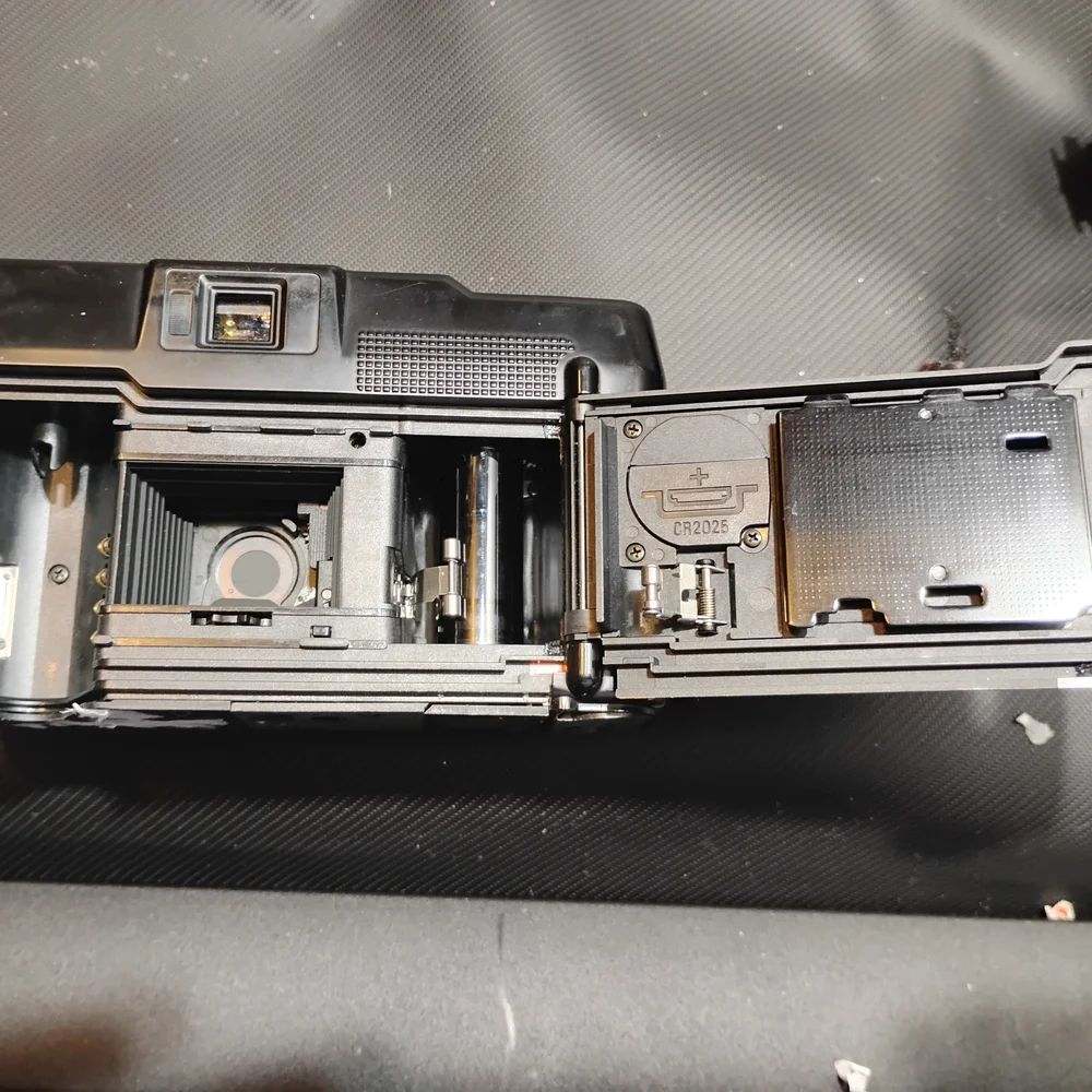 Nikon Black Camera with Gold Detail